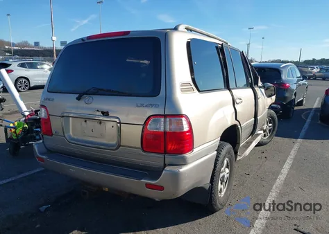 1999 Lexus Lx 470 from USA, damaged, VIN JT6HT00W4X0049394
